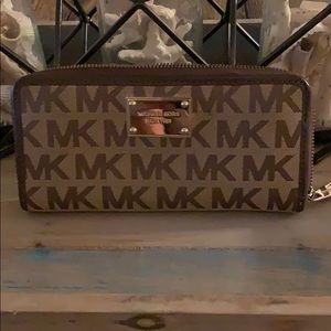 Michael Kors wallet brown and tan with gold zipper